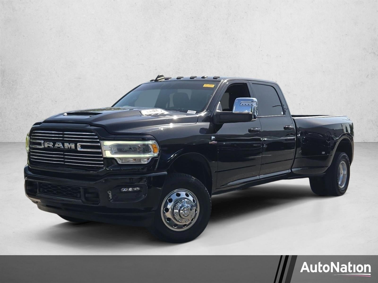 2024 RAM 3500 Laramie 4x4 Crew Cab 8' Box in Diamond Black Crystal Pearlcoat — front three-quarter view